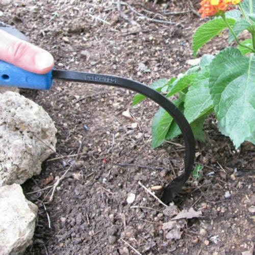 The CHC Cobrahead Weeding Tool, featuring an ergonomic handle, is perfect for digging soil near small plants.