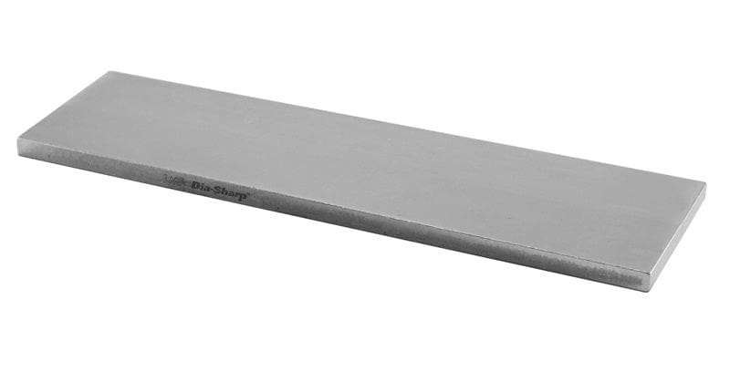 The DMT Dia-Sharp Diamond Bench Stone 11-in is a rectangular, silver, flat stone with a continuous diamond surface and faint Dia-Sharp text on the edge, shown angled on white—perfect for premium sharpening needs.