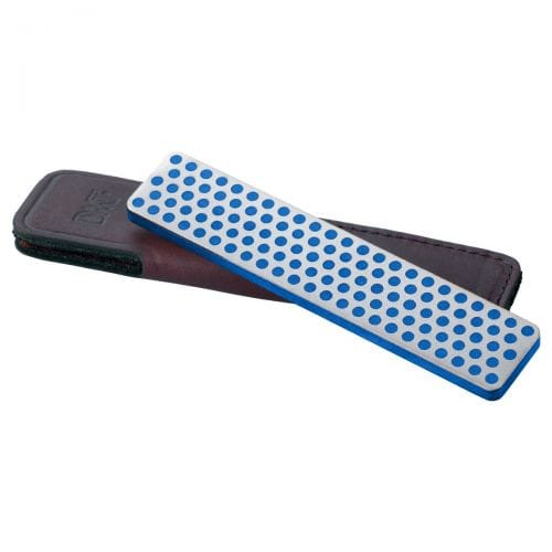 A DMT Diamond Whetstone with Sheath, featuring a 4” sharpening surface and a blue polka-dot design, is accompanied by a durable black and brown protective sheath.