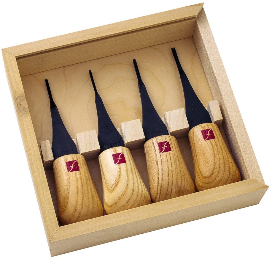 The Flexcut Micro Palm Set by FLE is a wooden box of four wood carving tools with ergonomic handles and black high carbon steel blades, each handle featuring a red square logo. Perfect for detailed or miniature carving work.