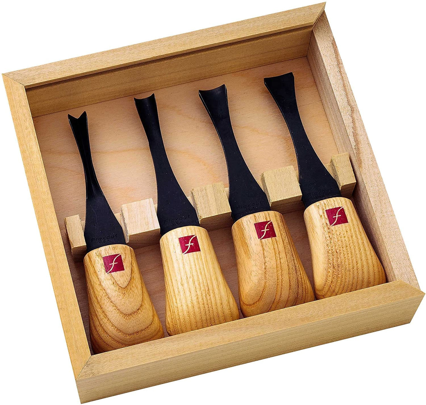 The FLE Flexcut Wide-Format Palm Set is a wooden box with four palm gouges, each secured in its own slot, featuring ergonomic wooden handles and black high carbon steel blades.