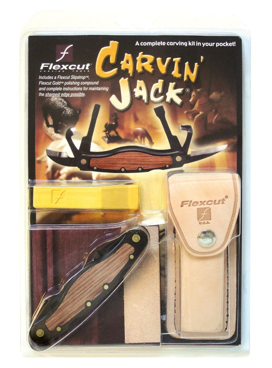 FLE Carvin Jack carving kit in packaging, includes a folding woodcarving multi-tool, polishing compound, Flexcut Slipstrop, and tan leather sheath. Packaging shows carved wooden figurines in the background.