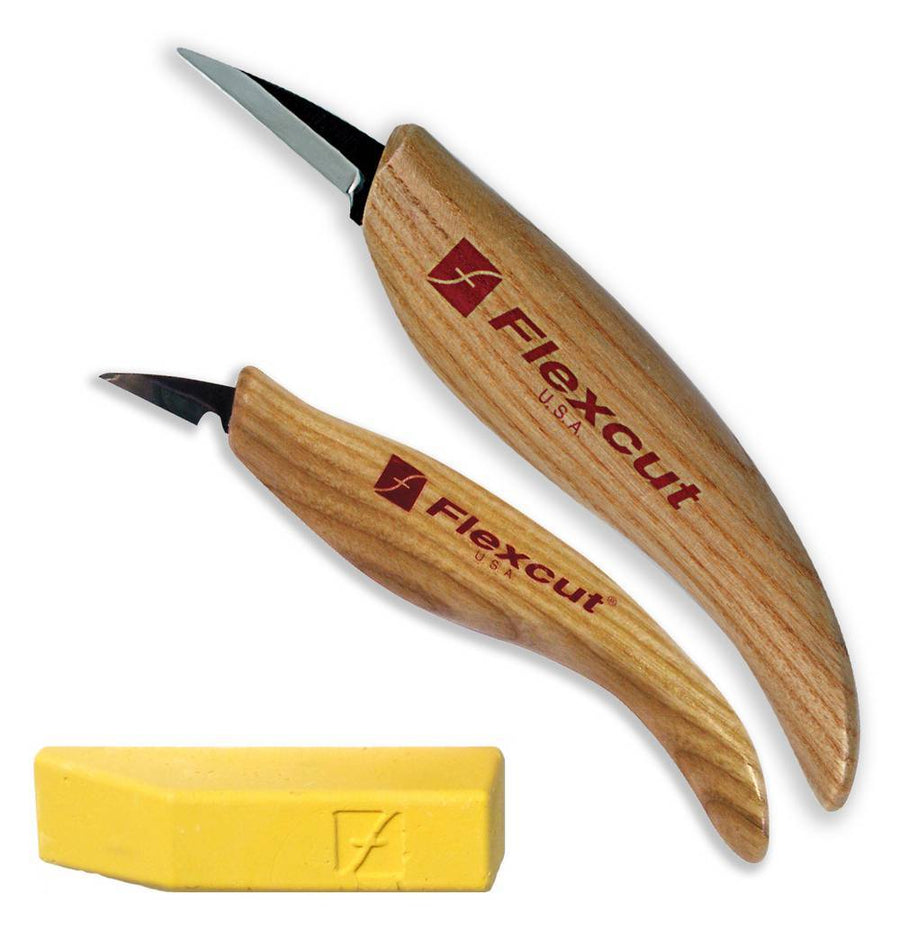 The Whittler's Kit includes two wood carving knives with wooden handles branded "FLE" and a yellow sharpening block, making it perfect for whittling.