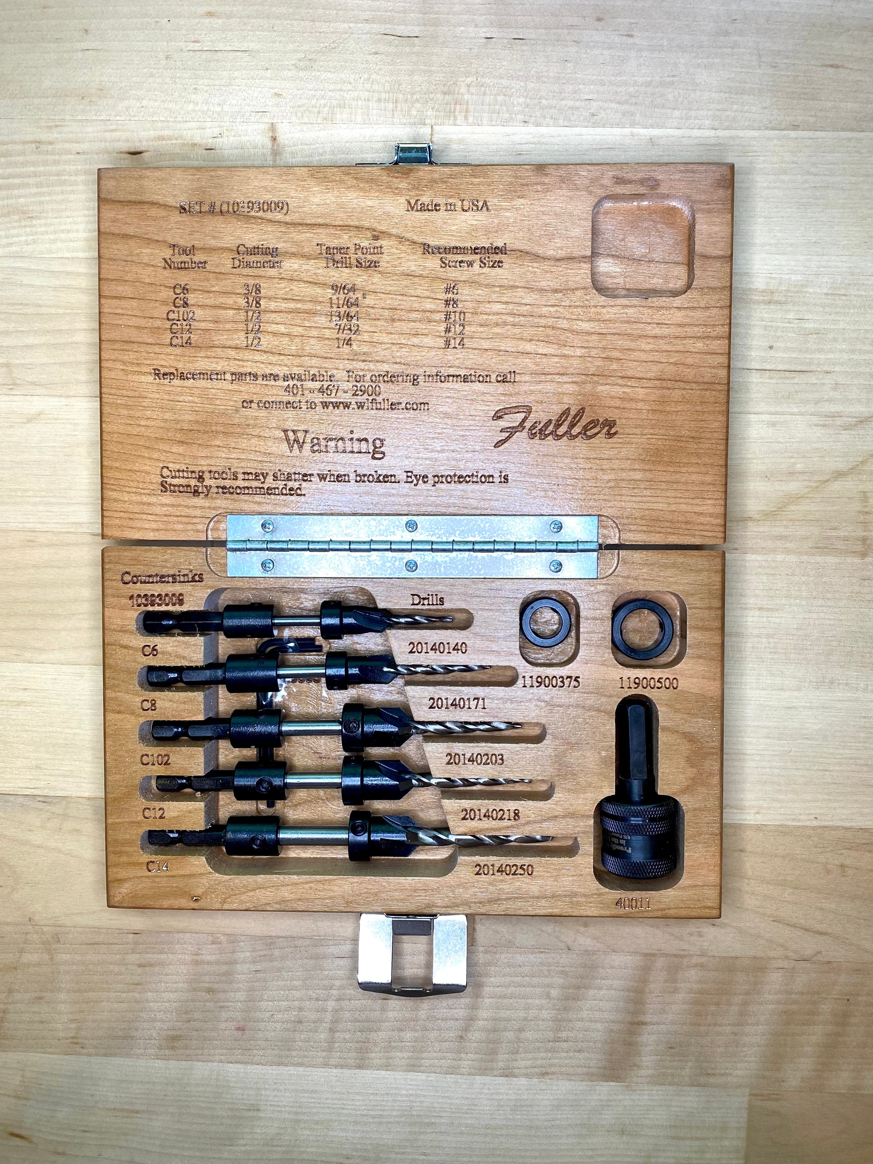 The Ful Counter Sink Set comes in a wooden box with labeled slots for taper point drill bits, countersinks, plug cutters, and a hex key. The lid is engraved with instructions and specifications.