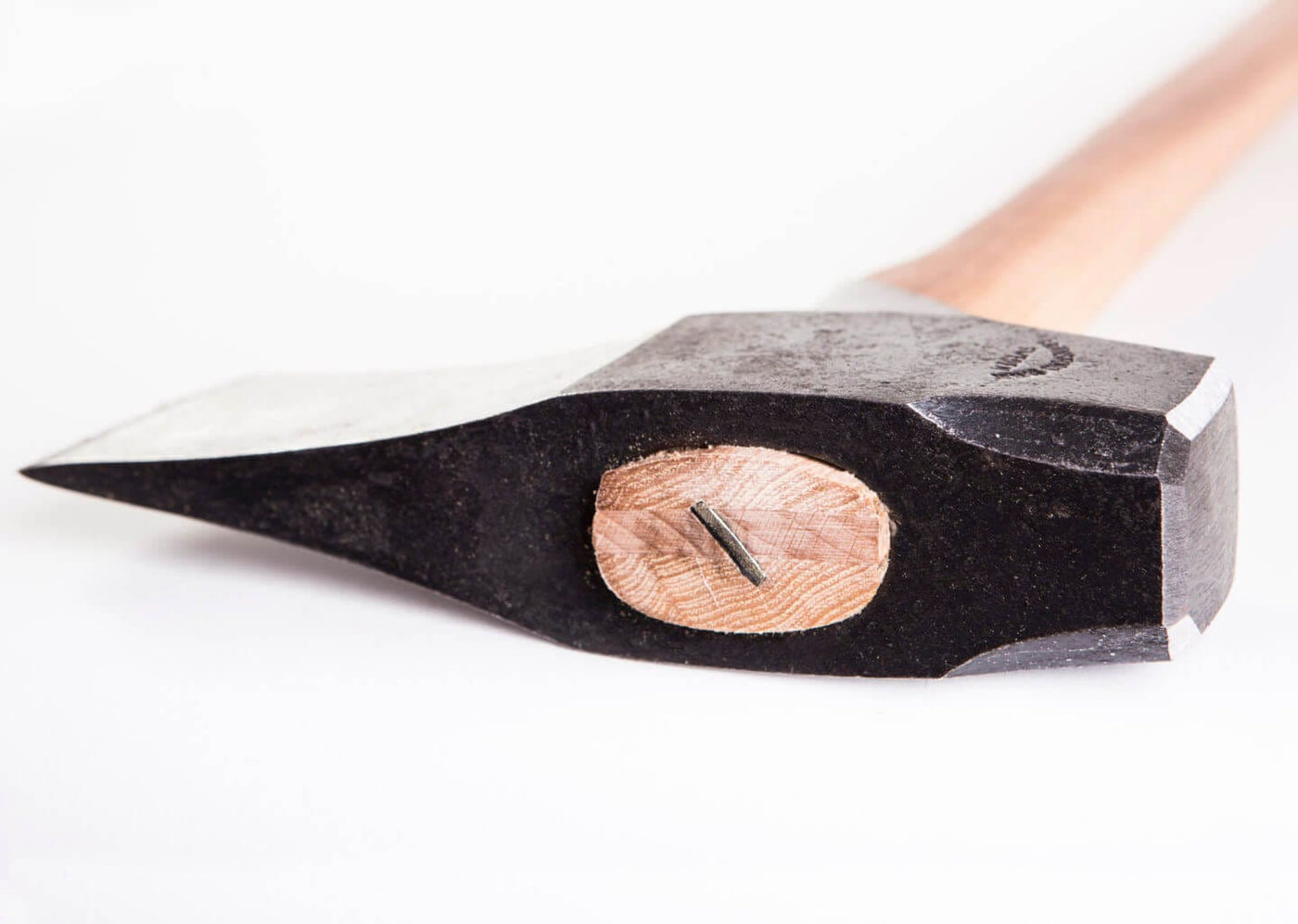 A close-up of the GRF Gransfors Bruk Splitting Maul W/ Collar Guard 450, featuring a black head and wooden handle with metal wedge, designed for efficient wood splitting, shown against a white background.