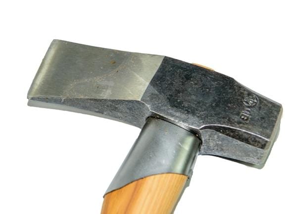 Close-up of a blacksmith's hammer with a metal head and wooden handle on a white background, evoking the traditional craftsmanship found in tools like the GRF Gransfors Bruk Large Splitting Axe 442.