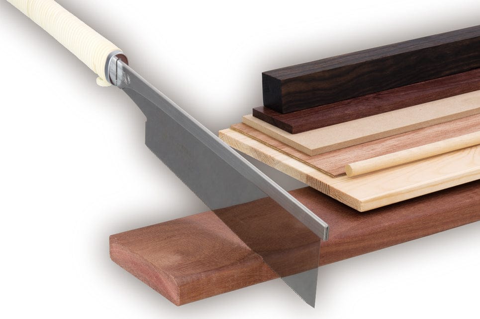 The BBT Rip Cutting Razorsaw Dozuki is positioned above stacked wooden boards of varying types and thicknesses on a white background—ideal for precision woodworking and hardwood cutting.