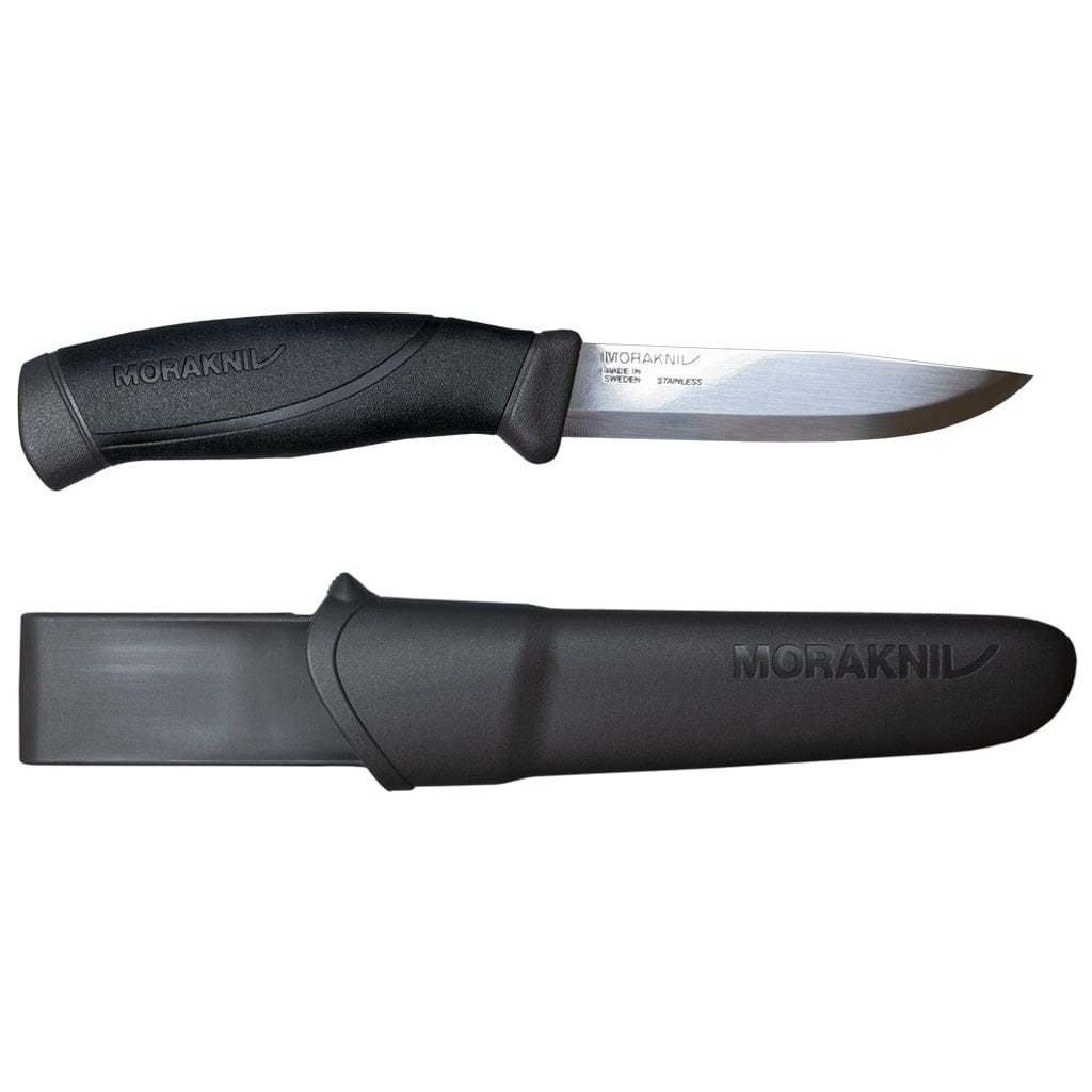 The Companion Adventure Knife by Industrial Revolution is an outdoor fixed-blade knife with a black ergonomic handle and a sleek stainless steel blade, paired with a matching black sheath.