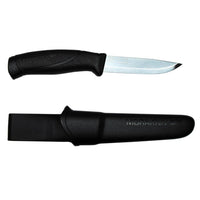 The Companion Adventure Knife by Mora, from Industrial Revolution, features a stainless steel blade with an ergonomic black handle, and comes with a matching black sheath labeled "Morakniv," making it ideal for outdoor use.