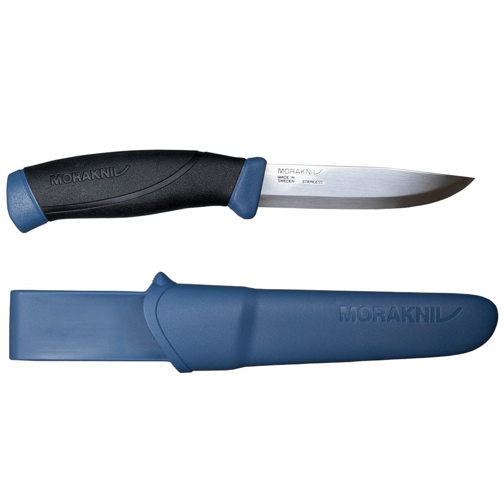 The Companion Adventure Knife by Mora, from Industrial Revolution, features a stainless steel blade with an ergonomic black handle and includes a blue sheath labeled "MORAKNIV," making it an ideal outdoor knife.