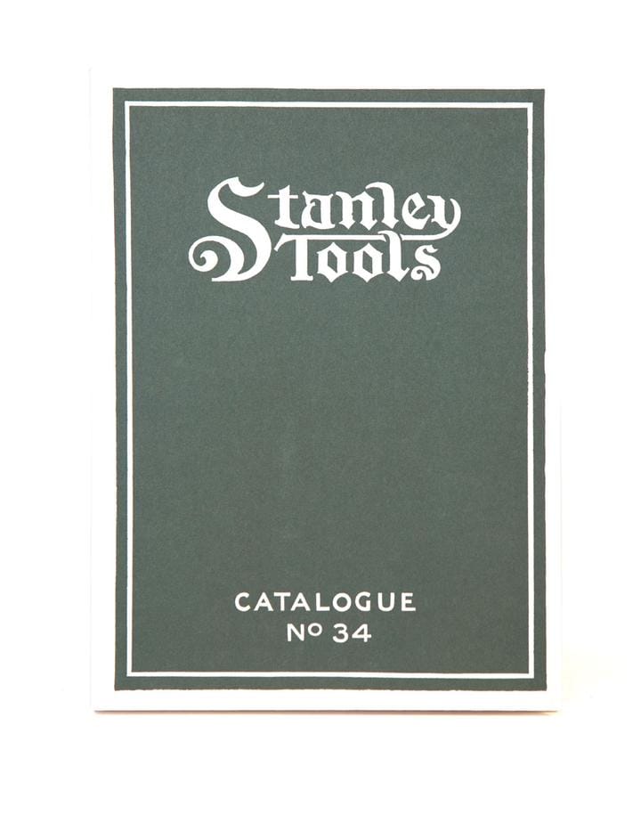 The cover of the Stanley Tools Catalogue Number 34 by LAP is green with white text and a decorative border, evoking the charm of treasures found at antique markets, reflecting the enduring allure of quality hand tools.