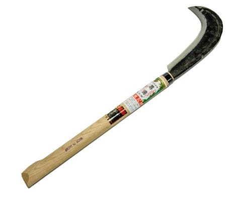 The MARU Sickle Axe is a stunning tool with a wooden handle and a razor-sharp, crescent-shaped blade crafted from hand-forged laminated high carbon steel. Ideal for precision tasks, it features an elegantly attached label on the handle.