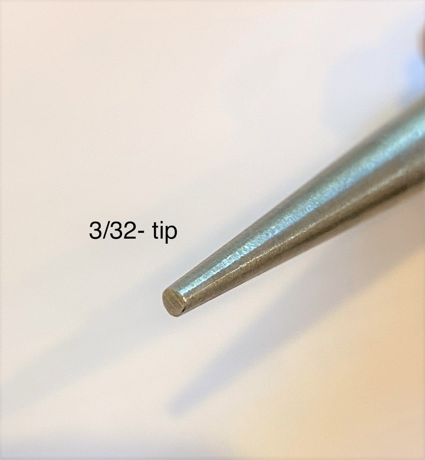 Close-up of a MARU Japanese Nail Set tool with a "3/32- tip," showcasing the elegance of Japanese design against a light background.