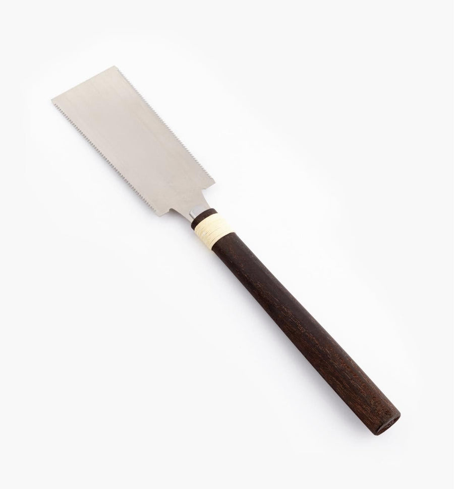 The MARU Fine Wood Working Ryoba is a hand saw with a dark wooden handle and a thin, rectangular metal blade featuring fine teeth. It is perfect for precise cuts in woodworking projects and ideal for those who prefer the precision of a traditional ryoba saw.