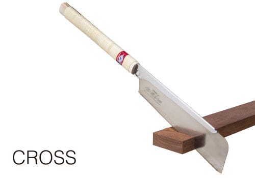 A Z-Saw Hardwood Dozuki 240 by MARU with a light-colored handle lies on a wooden beam. The word "CROSS" appears in the lower-left, highlighting its use for fine woodworking and suitability for hardwood.