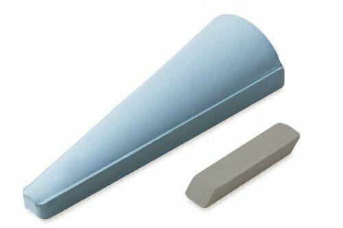 The MARU Cone Slip Stone, a blue wedge-shaped doorstop, and a gray rectangular block resembling gouge sharpening stones are displayed on a white background.