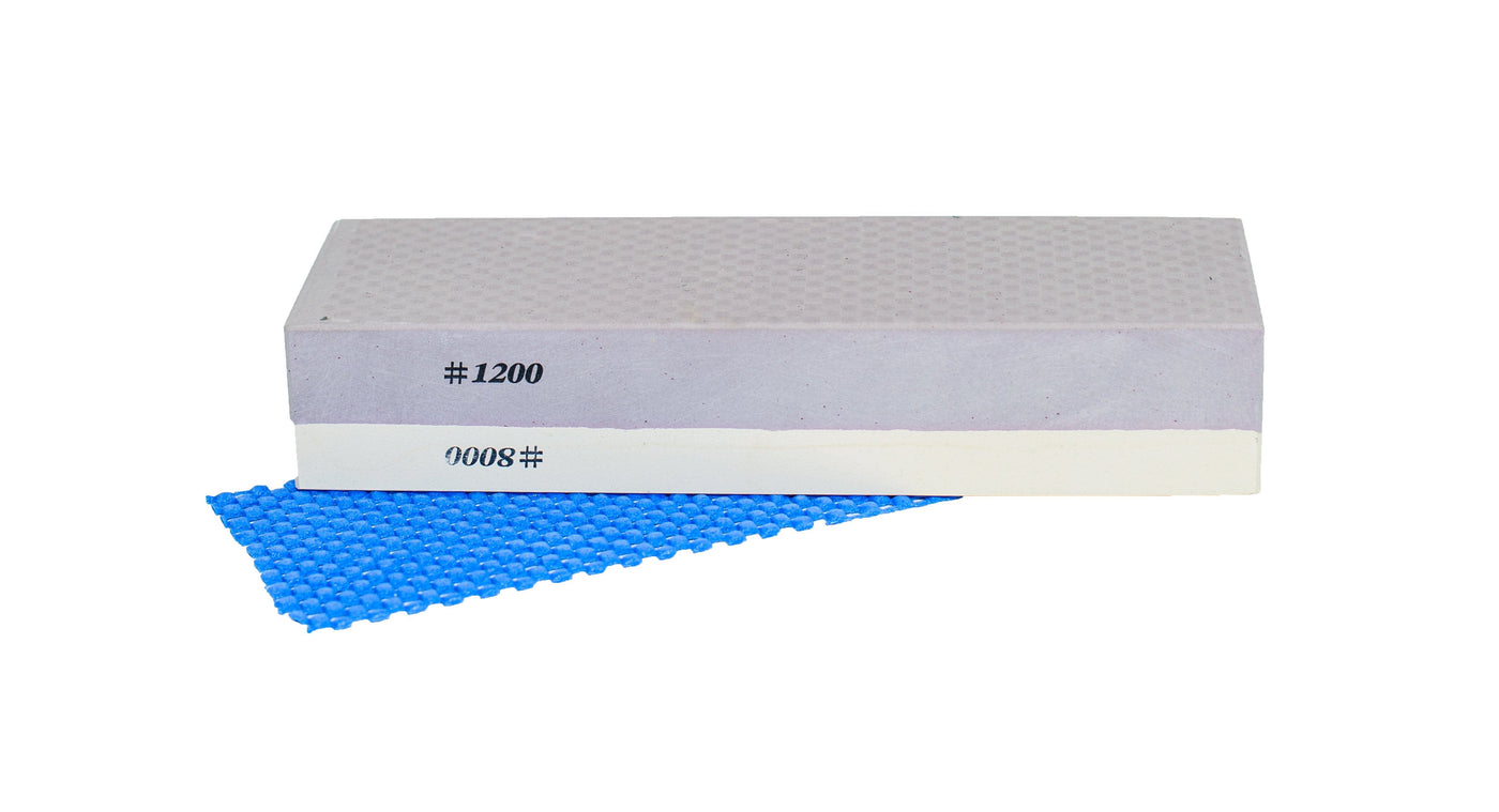An 8000 Grit Kitayama Stone from MARU, marked with "#8000" and "0008#", rests atop a blue textured mat.