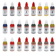 A set of 24 bottles of Mixol Stains by MIXOL, each numbered from 1 to 24 and varying in color, can also be used as a versatile tinting paste.