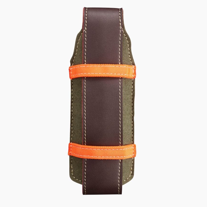 The Opinel Mushroom Knife sheath, in brown and green with orange straps and visible stitching, combines practicality and style. Perfect for mushroom picking adventures, it is designed to hold an axe or similar tool.
