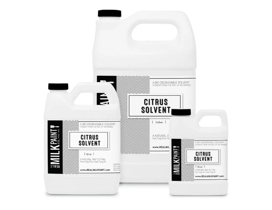 Three white containers labeled "Citrus Solvent," designed in black and white with "RMP" branding, showcase an eco-friendly paint thinner famous for its natural degreaser properties.