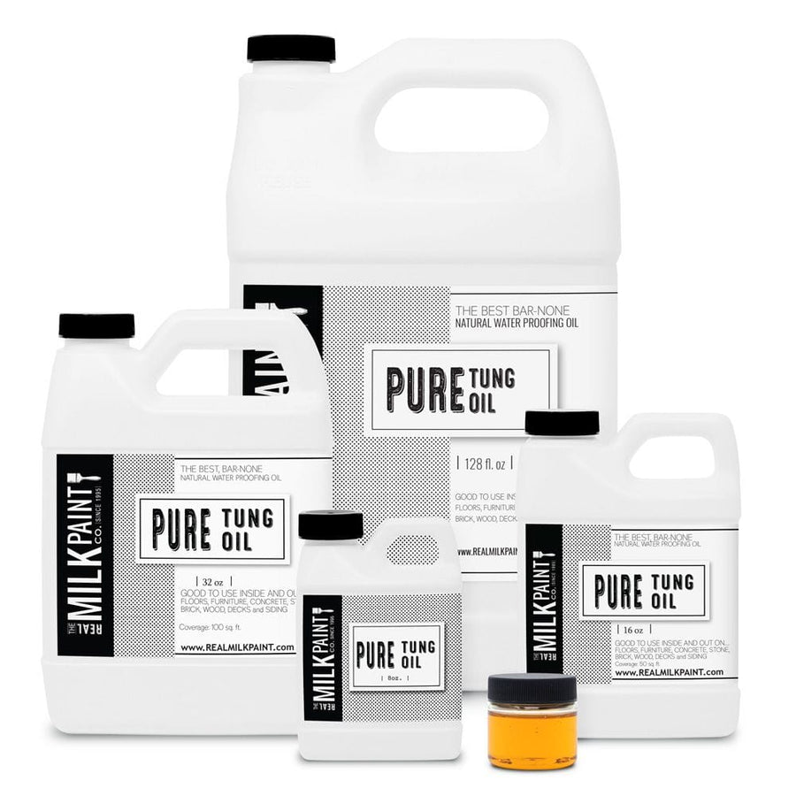 Bottles of RMP Pure Tung Oil, approved for food contact and environmentally friendly, are available in multiple sizes. Each bottle showcases a black and white label with comprehensive product details.