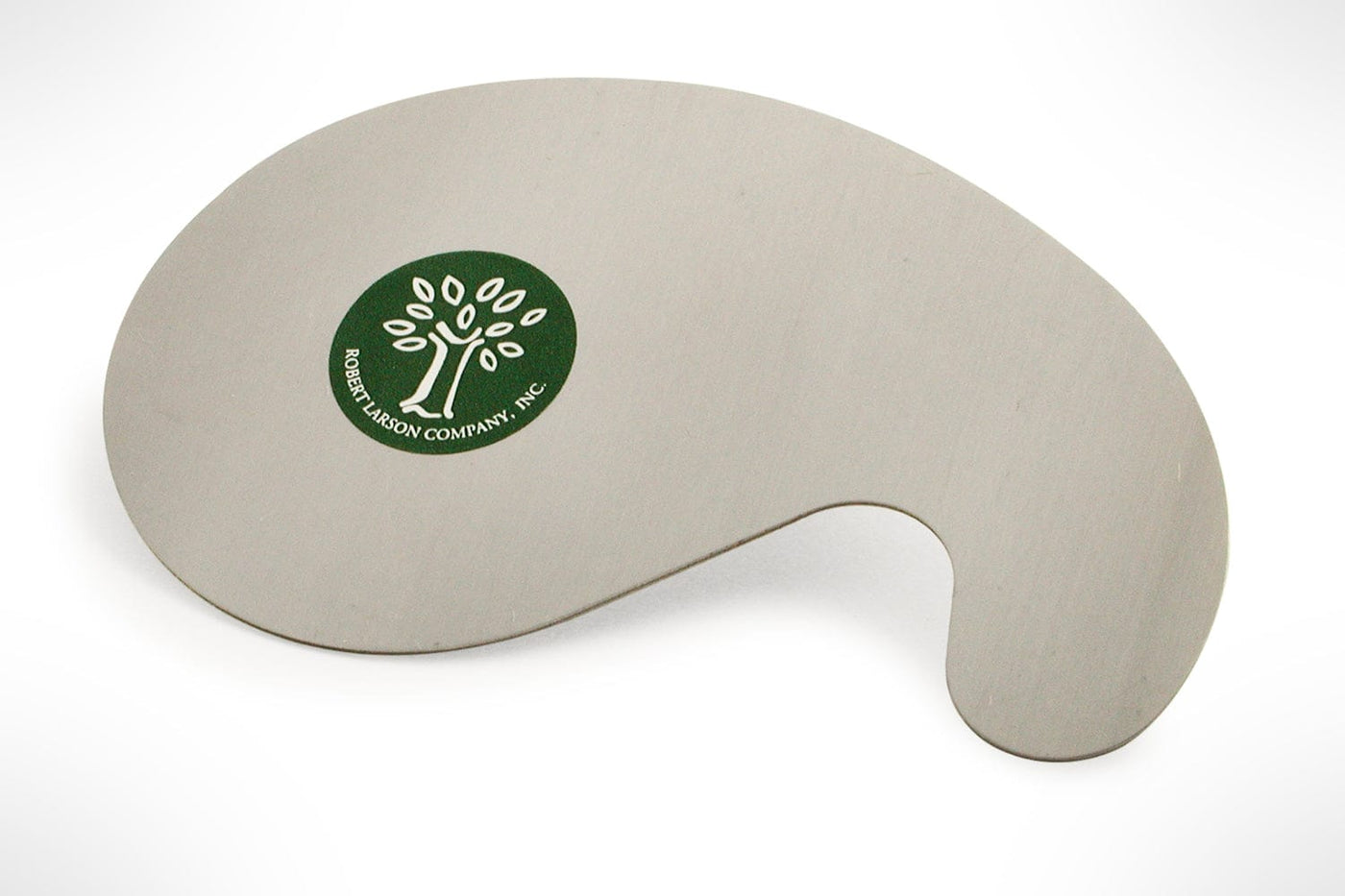 The ROB Cabinet Scraper is kidney-shaped, made from premium German steel, and features a distinctive tree logo at its center. Its smooth surface complements tools like a burnisher flawlessly.