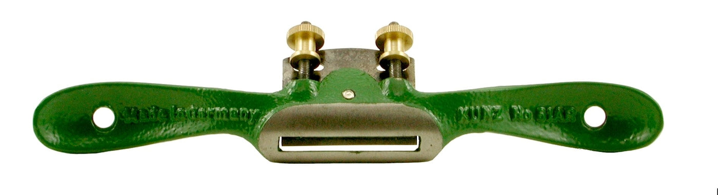 The ROB Kunz Spokeshave with Adjustable Blade is a green metal, flat-bottom tool with two handles and brass adjustment screws, designed for shaping and smoothing wood. The centrally placed blade ensures precise work. Made in Germany.