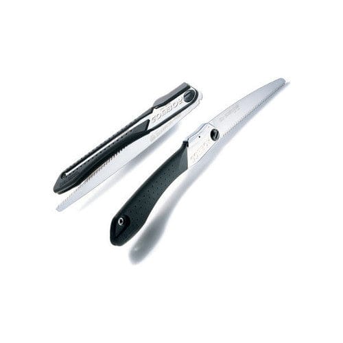 Two SHT Silky Gomboy 270 folding saws are shown: one open, displaying its serrated silver blade for carpentry, and one closed with the blade concealed in the black handle.