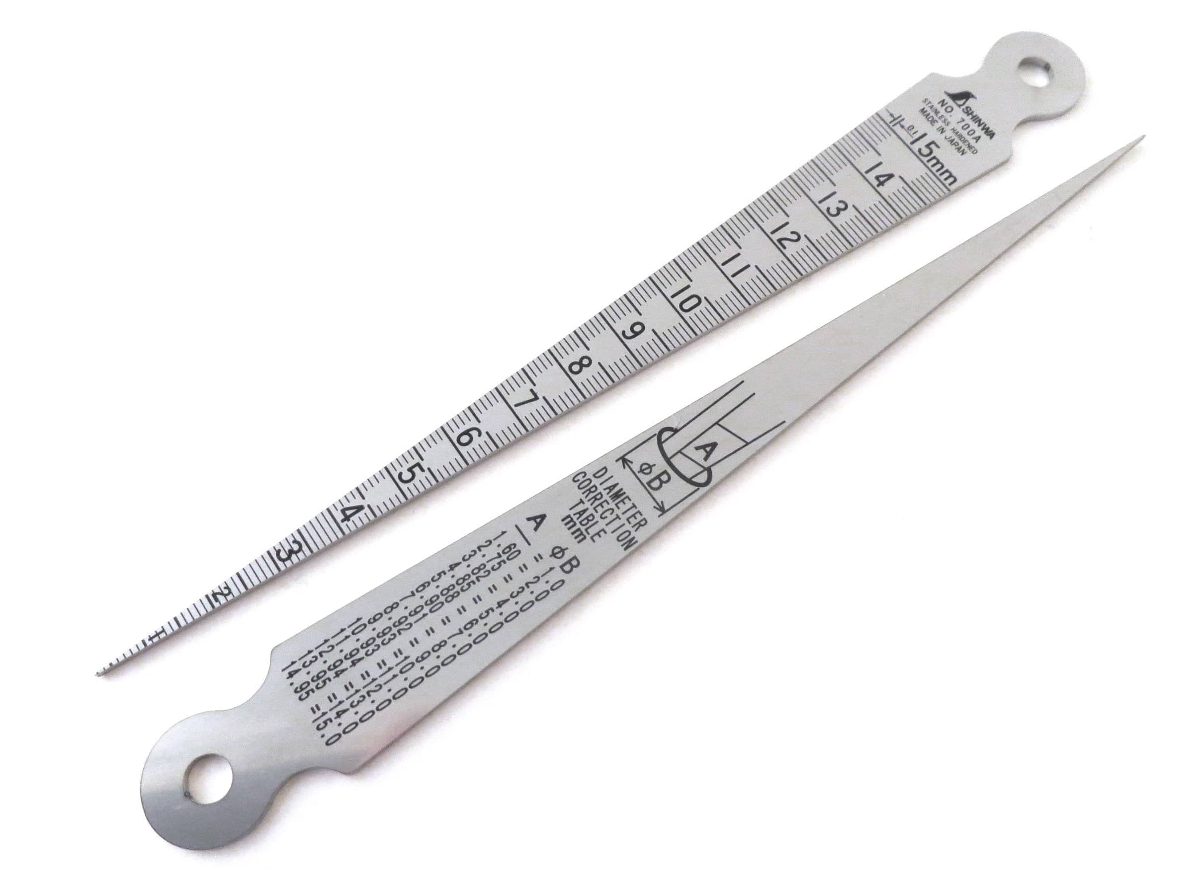 Two metal measuring tools made of hardened stainless steel with millimeter markings and pointed tips for precision use. Ideal for professionals, these instruments, including the SHWA Taper Gauge, ensure accuracy in every measurement.