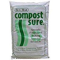 A bag labeled "SUN Compost Sure Composting Toilet Bulking Material" with green text states it is "Specially Formulated Composting Bulking Material for use in Sun-Mar composting toilets and Sun-Mar home composters," designed to enhance rapid decomposition.