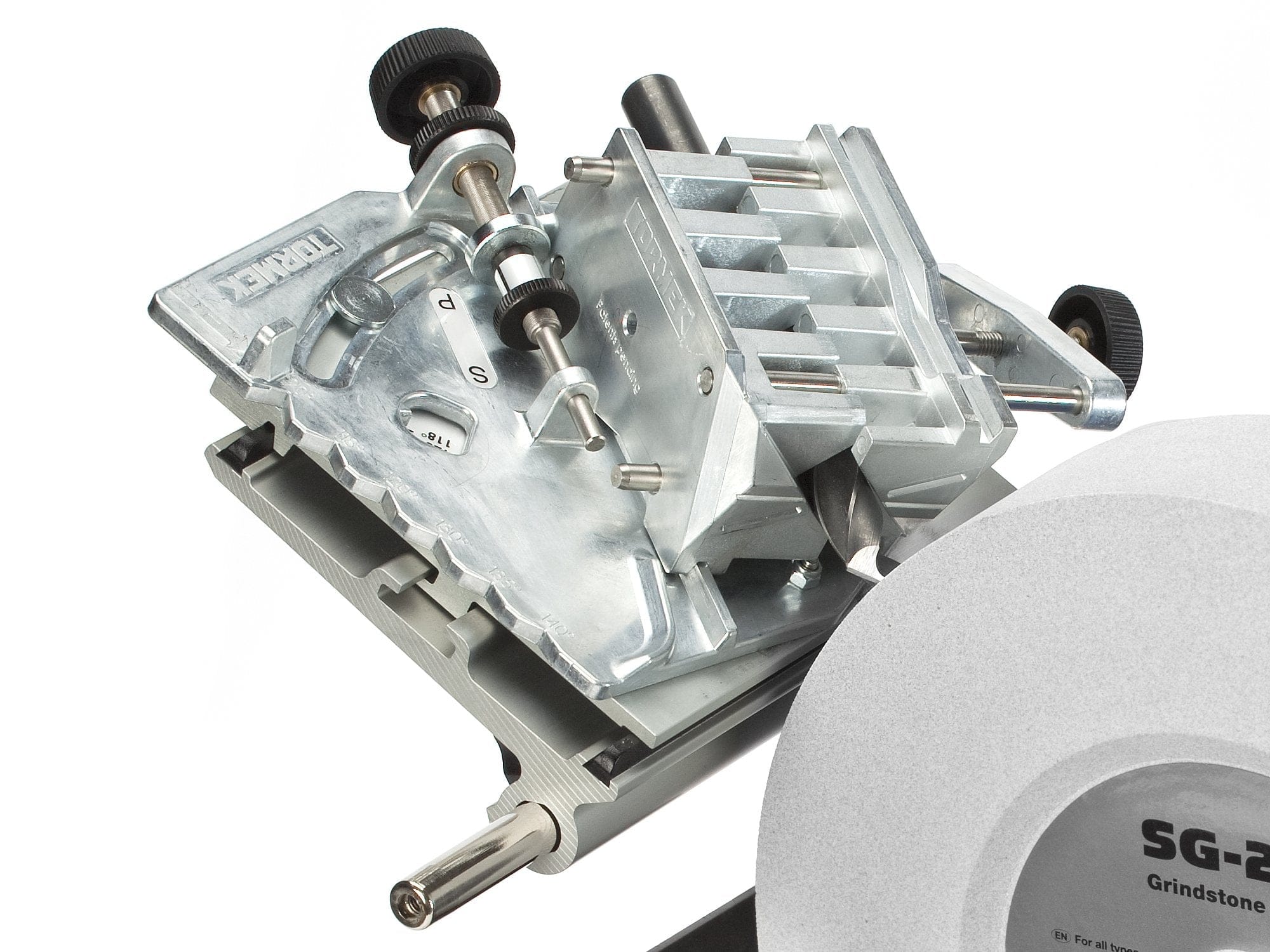 Close-up of a Tormek Drill Bit Sharpening Attachment by TOR on an SG-250 grindstone. It includes adjustment knobs for precision and is ideal for sharpening drill bits with a 4-facet point.