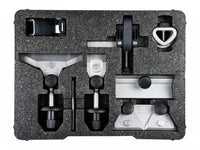 The TOR Tormek Hand Tool Kit is a black case featuring assorted metal and plastic automotive glass repair tools—such as clamps, mounts, and applicators—each organized in their own slots.