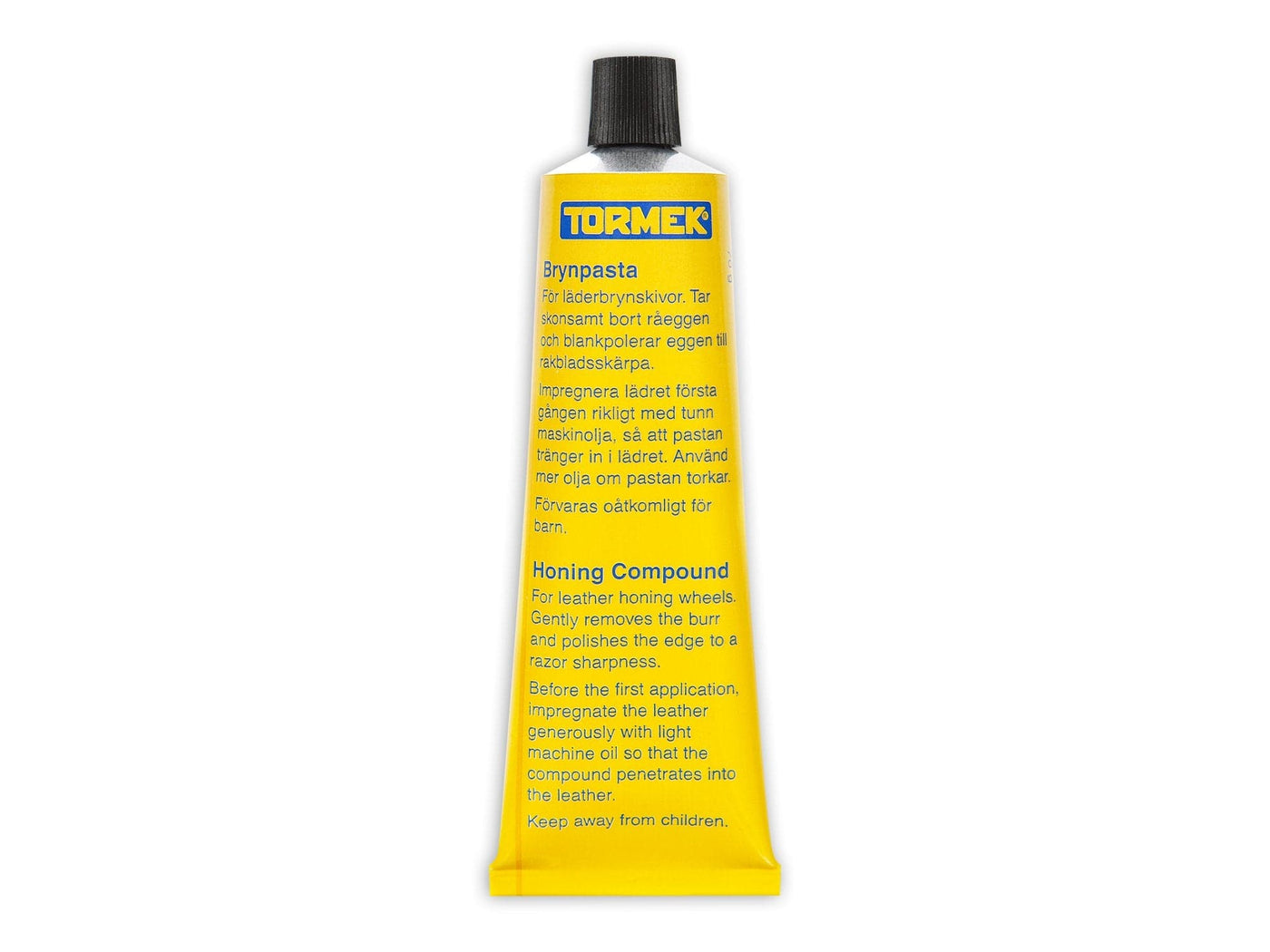A yellow tube of TOR Tormek Honing Compound for leather honing wheels with micro abrasives, clear Swedish and English instructions, and a black cap.