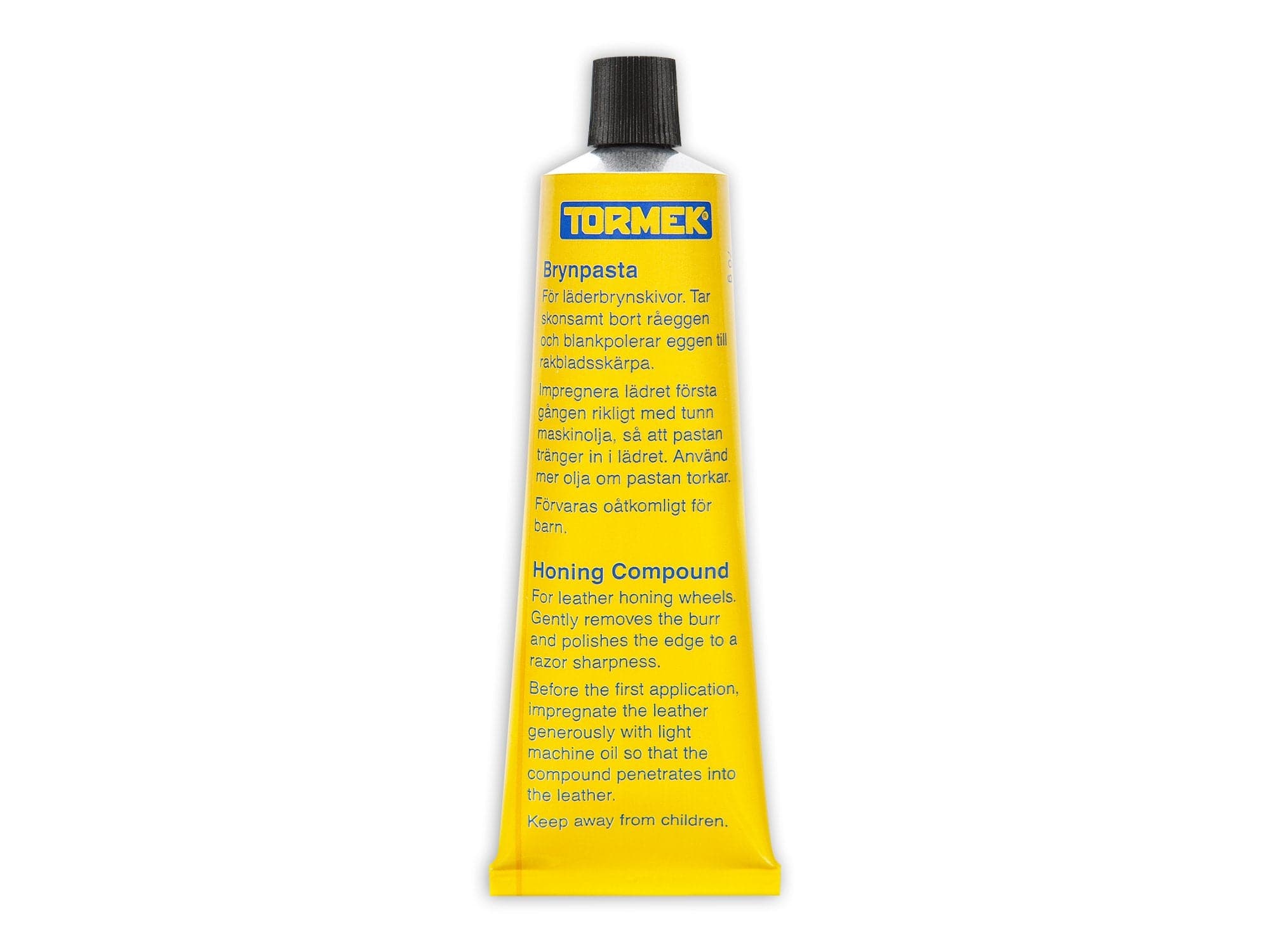 A yellow tube of TOR Tormek Honing Compound for leather honing wheels with micro abrasives, clear Swedish and English instructions, and a black cap.