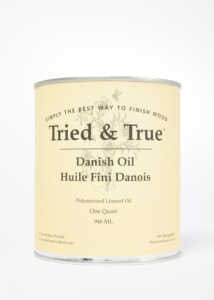 A can of TRD's Tried & True Danish Oil Finish, labeled as "One Quart" and "946 mL," is displayed against a plain background. This high-quality linseed oil finish enhances the natural beauty and durability of wood stains.