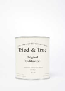 A can labeled "TRD Tried & True Original Wood Finish," showcasing an Original Wood Finish made from a blend of linseed oil and beeswax, set against a plain white background.