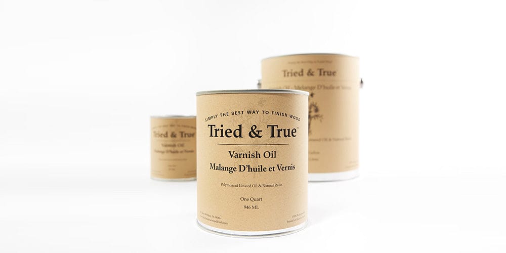 Three beige cans labeled "Tried & True Varnish Oil Finish" from the brand TRD, with black text, featuring three different sizes arranged against a white background, promising a premium wood finish ideal for interior woodwork.