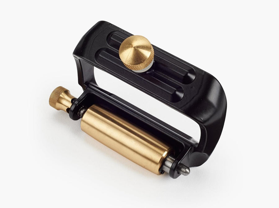The VER Camber Roller Assembly for Veritas Mk.II Honing Guide System features a black and gold metal design with a large gold knob on top and a cylindrical gold roller at the bottom, displayed against a white background.