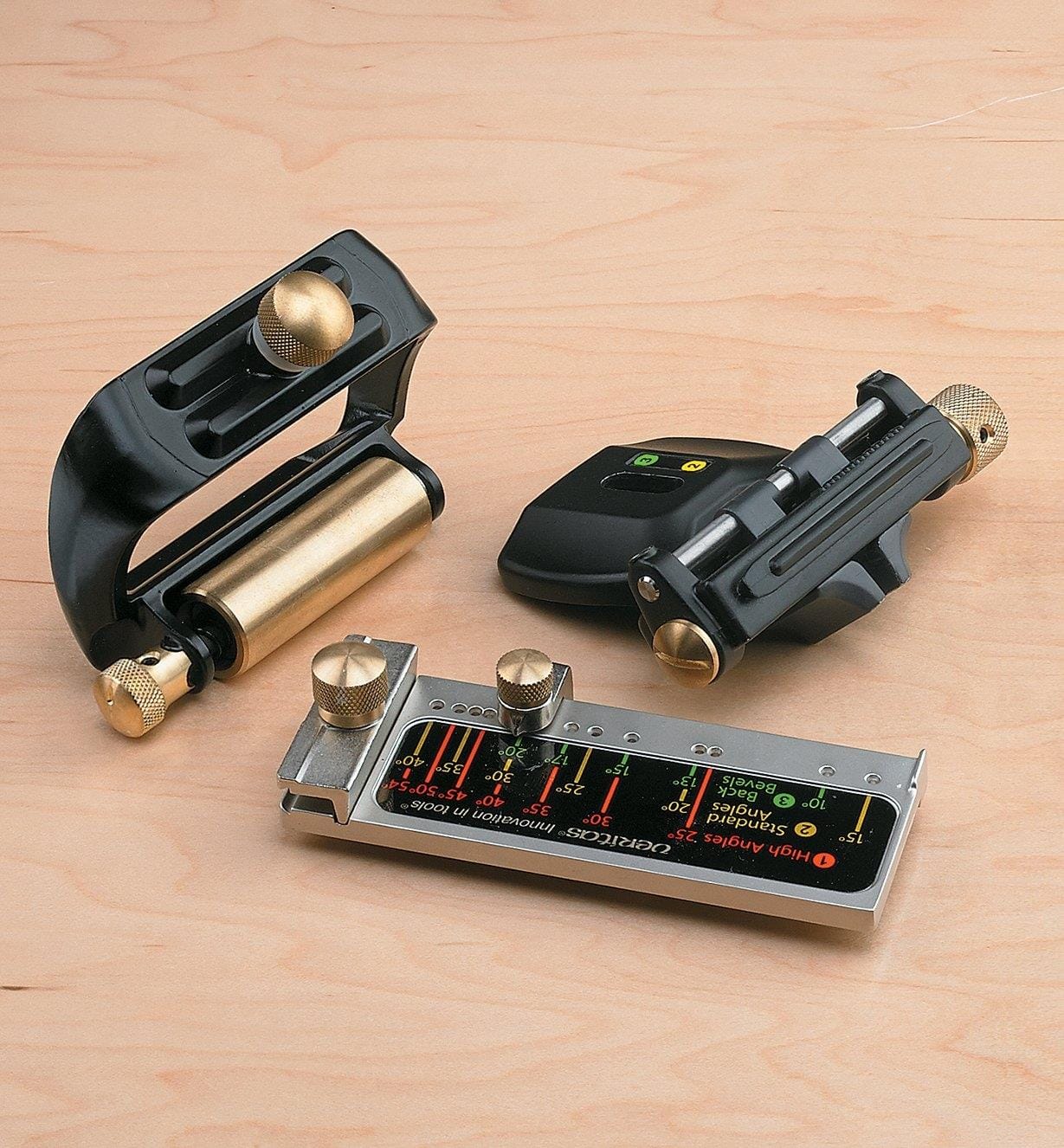 Image of a VER MKII NARROW BLADE HONING GUIDE on a wooden surface, featuring consistent honing guides, a digital angle gauge, and sharpening angle guides.