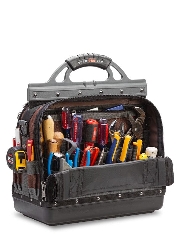 The VET Extra Large Compact Tool Bag in black and gray features rugged construction, ample pockets for pliers, screwdrivers, wrenches, and utility knives, organized compartments, and a sturdy top handle.