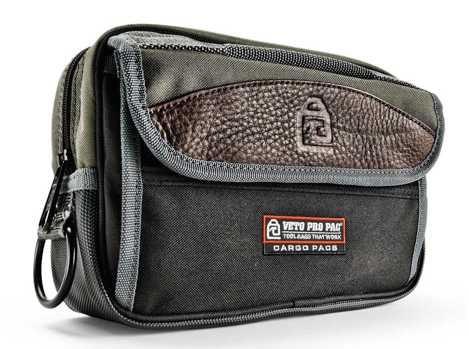 The Veto Pro Pac CP4 Horizontal Pouch by VET is a black and brown tool bag that features a zipper and multiple compartments for maximized tool storage. The pouch proudly displays the Veto Pro Pac logo along with "Cargo Pacs" on the front, making it an ideal small tool bag for professionals.