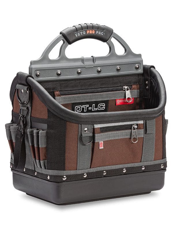 A heavy-duty, multi-pocket tool bag with reinforced handles and zipper compartments, labeled “Veto Pro Pac Large Open Top Tool Bag” by VET, crafted from rugged materials to endure tough conditions while maximizing tool storage capacity.