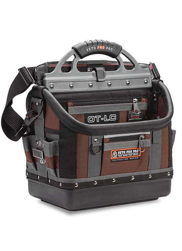 Introducing the VET Veto Pro Pac Large Open Top Tool Bag, a heavily reinforced compact tool bag designed for heavy-duty trades. Labeled “Veto Pro Pac” and “OT-LC,” it features multiple pockets, sturdy handles, and an impressive tool storage capacity. For added convenience, it includes a shoulder strap for easy carrying.