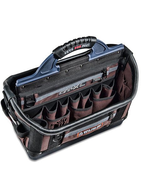 The Veto Pro Pac OT-XL by VET is an extra-large open top tool bag made from rugged materials, featuring multiple open pockets and compartments, a sturdy handle, and brand labeling. It's perfect for durable and efficient storage with easy access to essential equipment.
