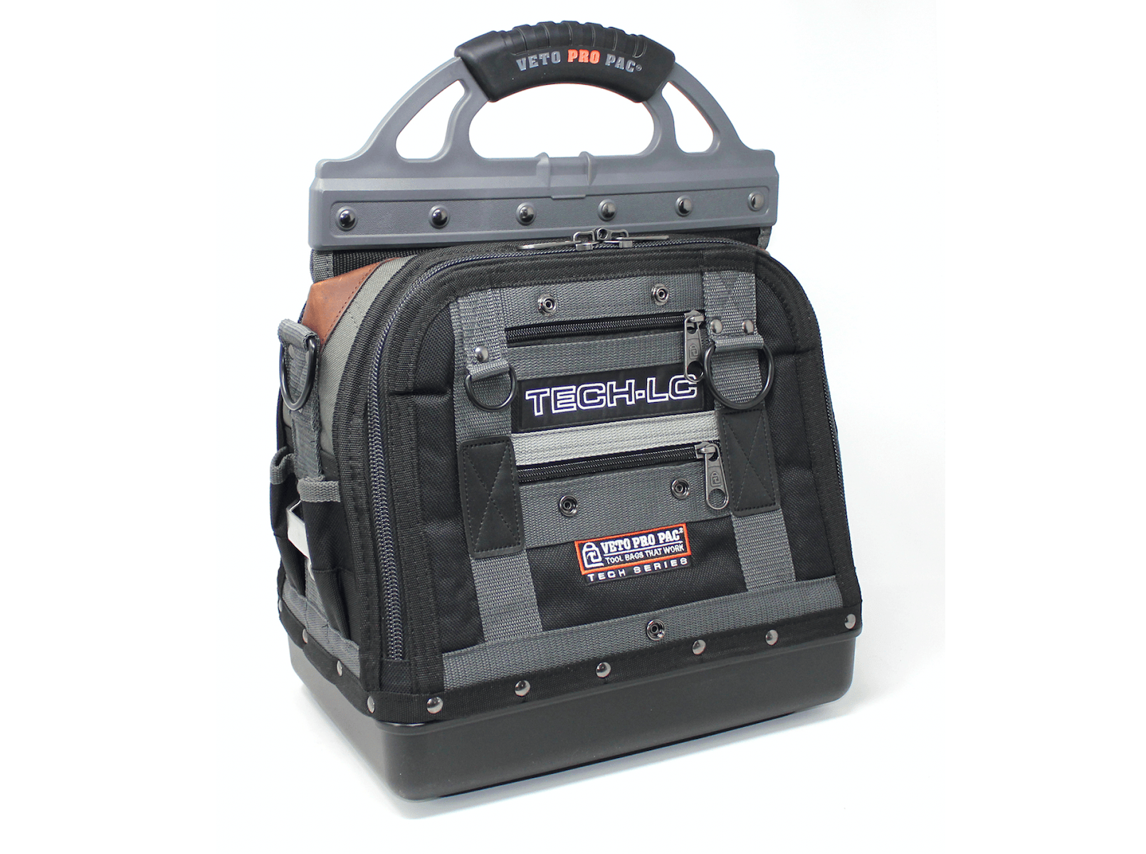 The VET Veto Pro Pac Tech-LC Large Tech Tool Bag features a black and gray design, sturdy plastic handle, multiple zippered compartments, and a reinforced base—ideal for HVAC tool storage.